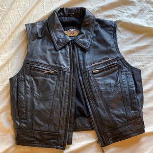 Harley Davidson vintage leather vest with original buttons and cinch.